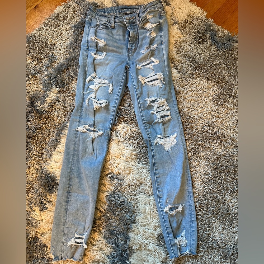 American Eagle Size 8 Regular Light Blue Very Distressed Stretchy Skinny Jeans
